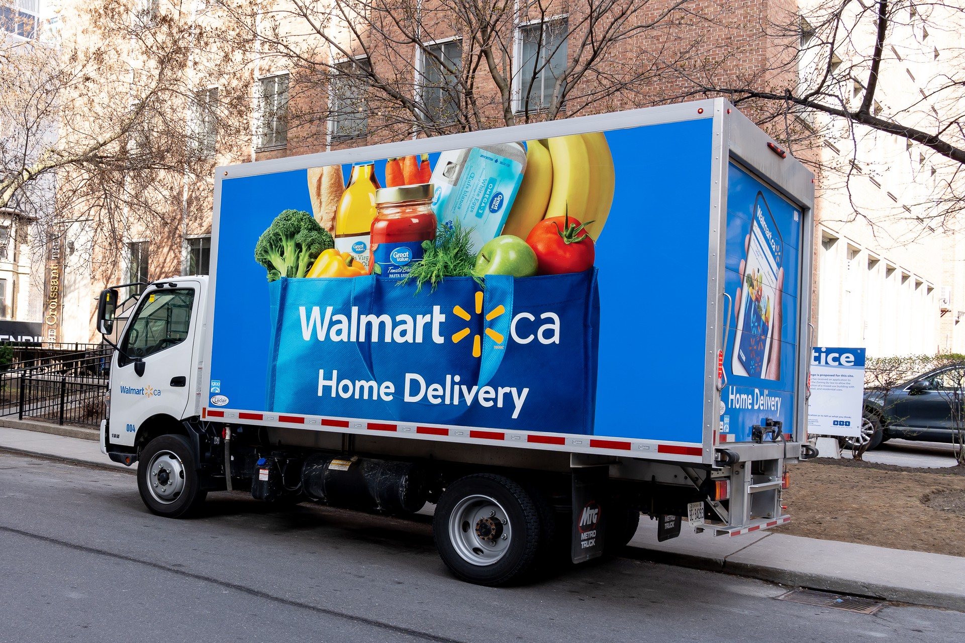 A Walmart home grocery delivery truck on the street in Toronto.